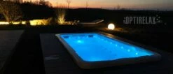 SwimSpa Pool Ultraswim I -Baden Verkaufs-Shop Pool bei Nacht Optirelax Swimspa Ultraswim Kleiner Luxus Gartenpool mit Beleuchtung 1200x520
